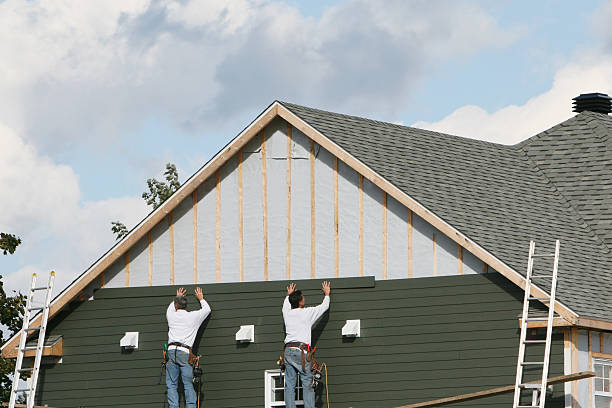 Professional Siding Contractor technician working in Thornton, CO